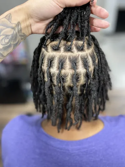 Locs by Evony (inside Famous the Barbershop)