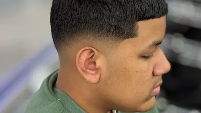 Aguila Barbershop inc