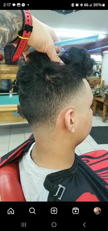 M B Barber Shop