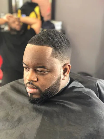 TAY’S CUT ABOVE THE REST Barbershop