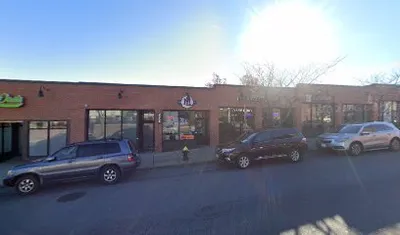 ATM Machine at Los Magicos Barber Shop