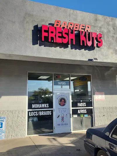 Michael Reed (Fresh Kuts Barbershop)