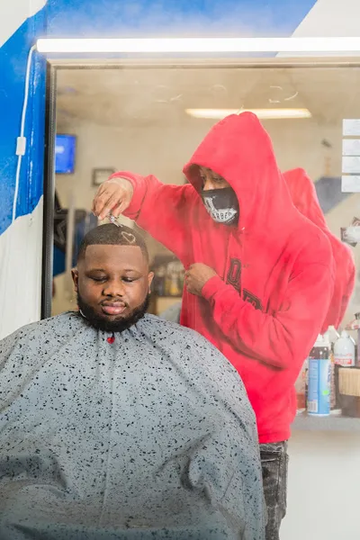 Q Tha Barber