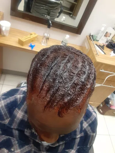 MOHOUSEWHONEXT Barber And Beauty Lounge LLC