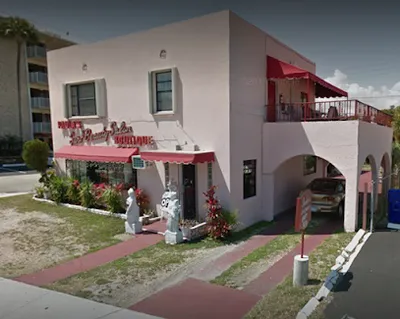 Sandy's Barber Shop By The Sea
