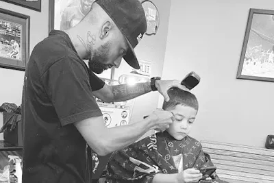 BEY'S BARBERSHOP (inside trends suite 15)