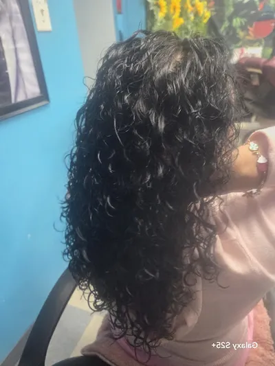 J & E Barbershop And Salon