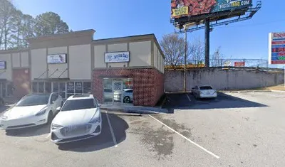 N.I.N.E Cut's Barbershop ( inside Walmart )