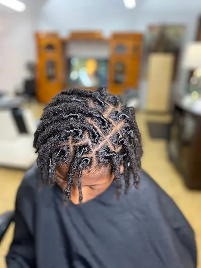 Kandi's Unique Barber & Beauty Shop