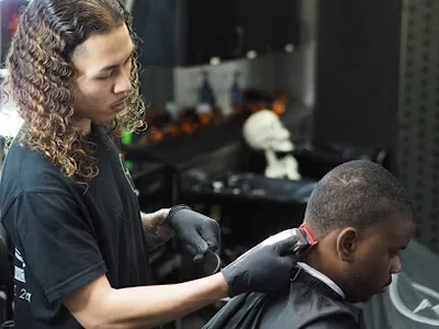 Q The Barber