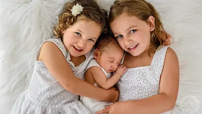 FAMILY PORTRAITS By Helen Connolly